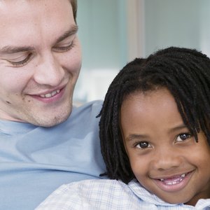 Adopted child and father.